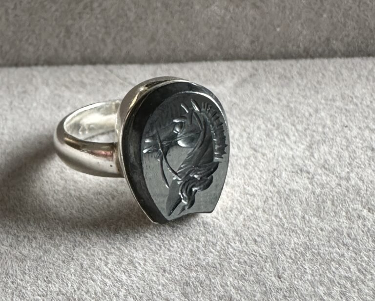 My first design: a unique piece with a carved obsidian hoof with a head of the horse. Set in Platinum. Designed by Valentina Leardi.