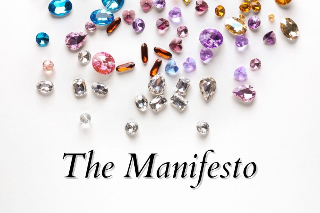 A waterfall of gemstones over a text that says the manifesto.