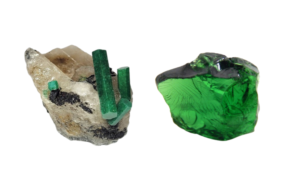 On the left a rough emerald with the matrix, on the right a rough tsavorite.