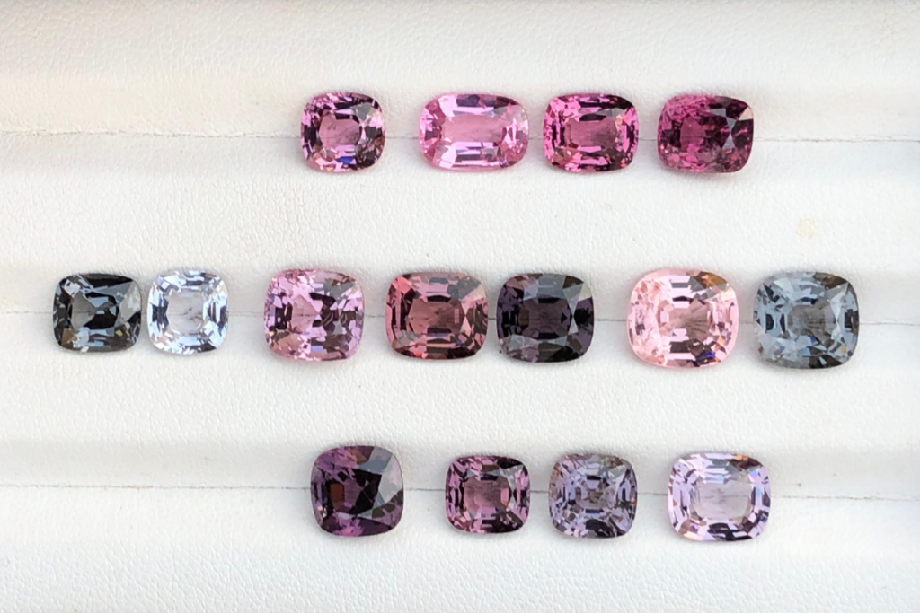 A lot of 16 spinels, showcasing different colors, gradients and quality.