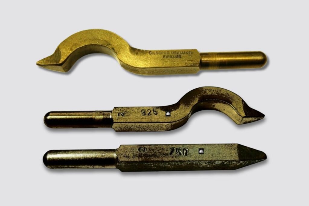 Three different punch stamps, two for rings and one straight.