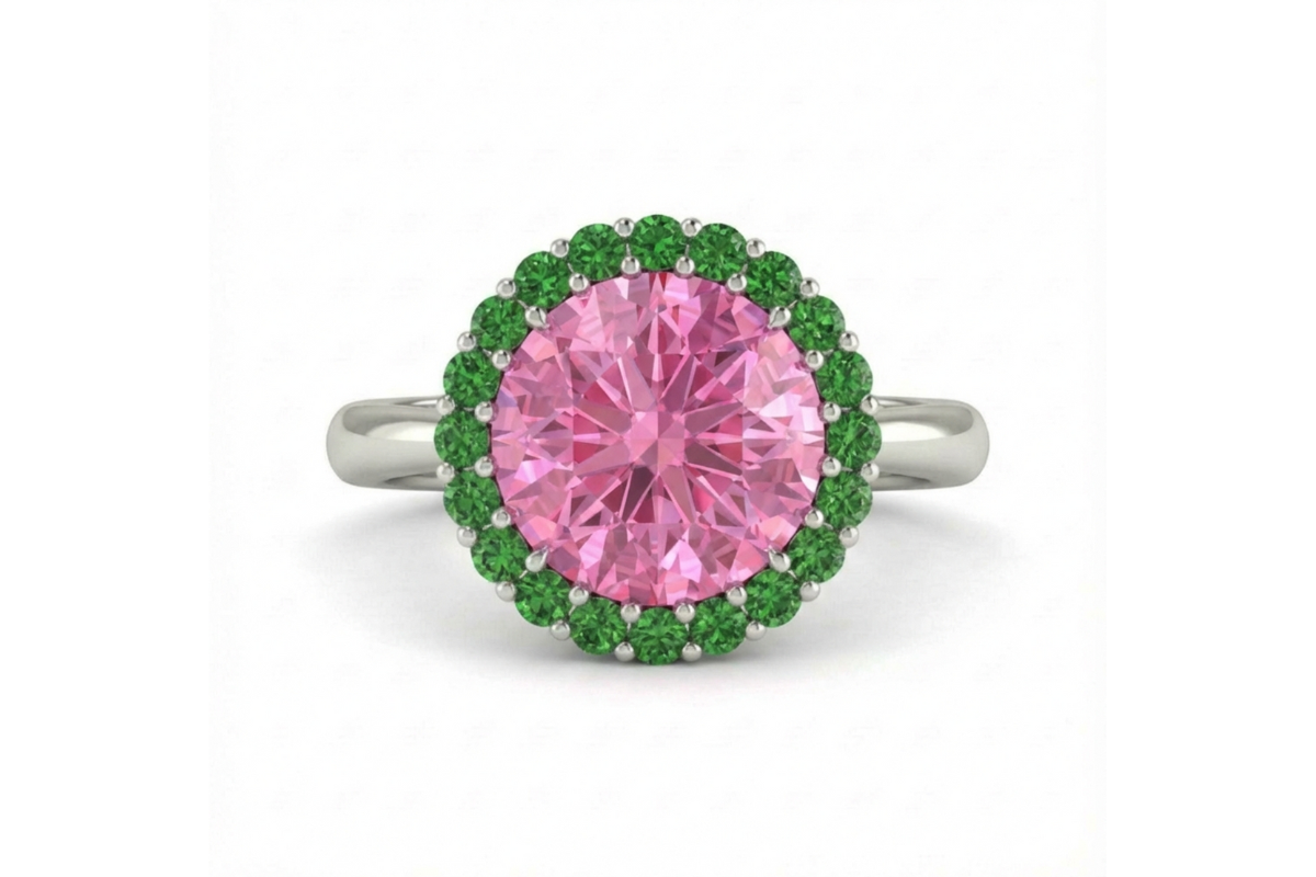 Our Icone Cromatique solitaire ring in the pink sapphire and green tsavorite version.