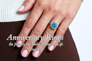 Anniversary Rings and the Jewelry We Build Through a Life Together. In the photograph our Chromatic Aura ring with a central aquamarine and yellow sapphires halo.